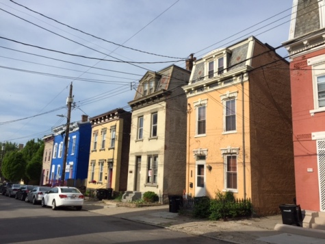 A row of townhouses bring color to Cincinnati's Victor Street.